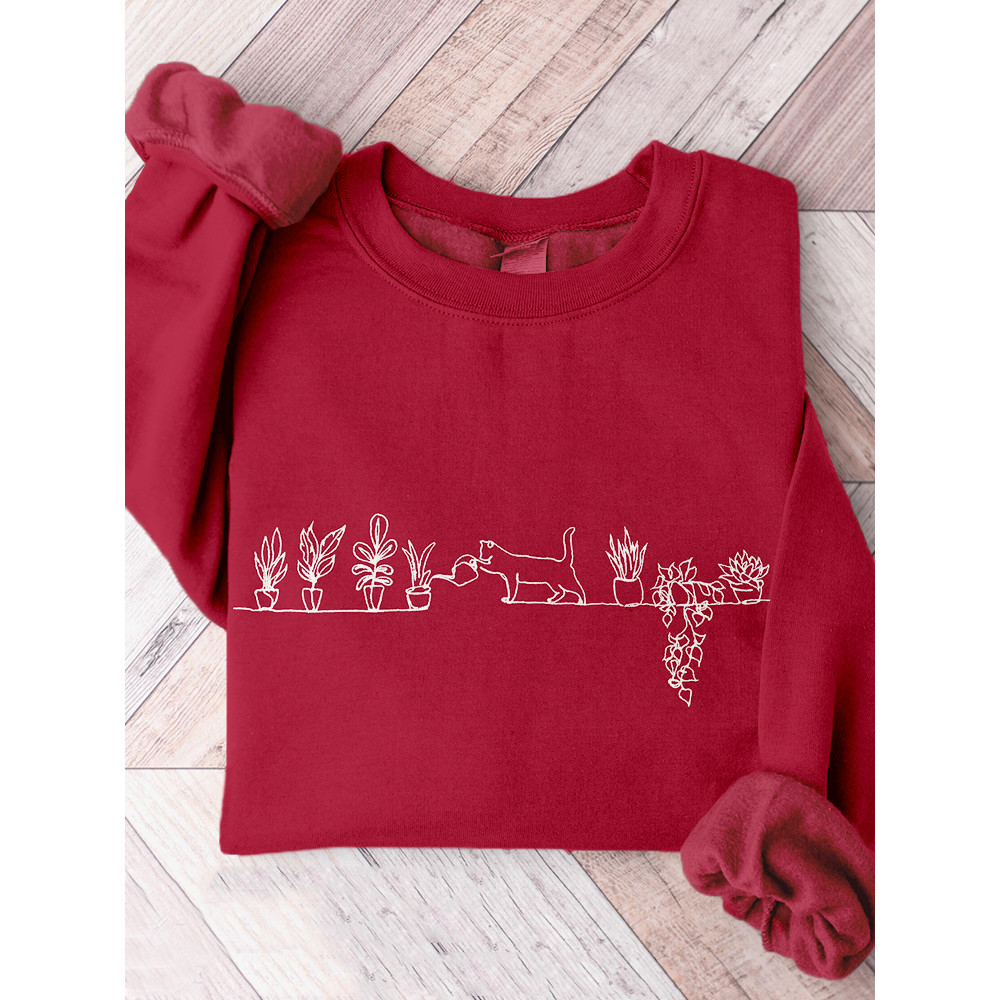 Cat Watering Plants Embroidery Art Comfy Sweatshirt